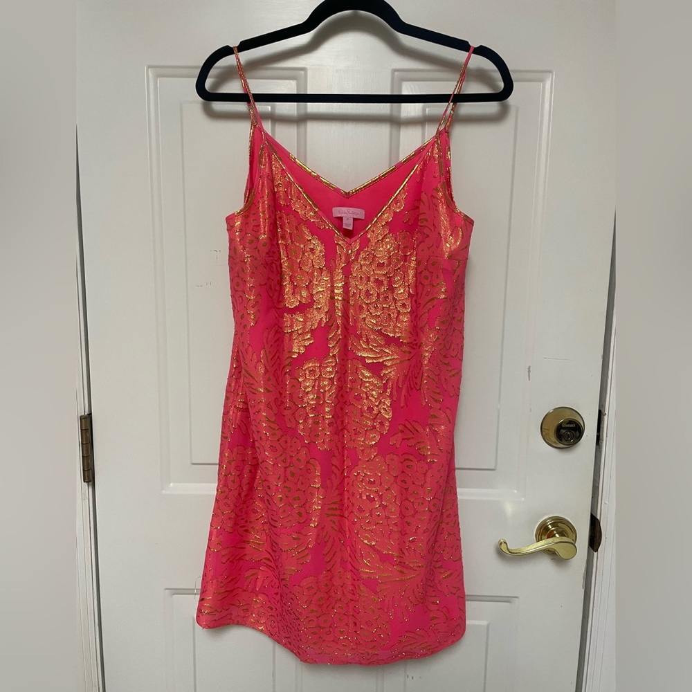 Lilly Pulitzer gold and coral cocktail dress.
